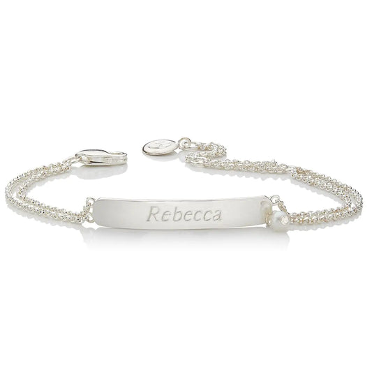 Silver bracelet with nameplate 'Rebecca' on a white background